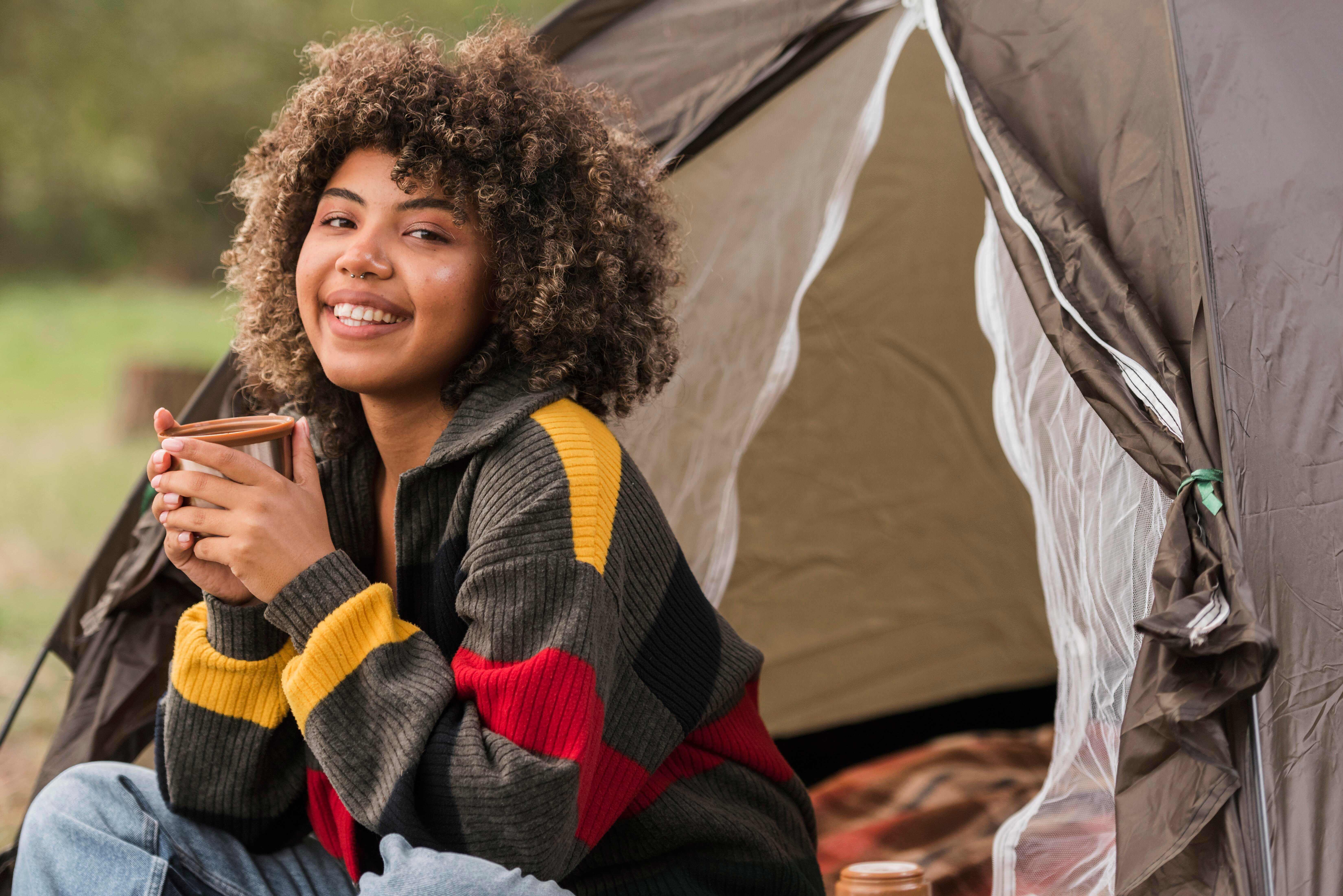 A woman camping--Image by Freepik
